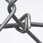 Hog Ring: Close-up of a durable and reliable hog ring used for secure and professional fastening.