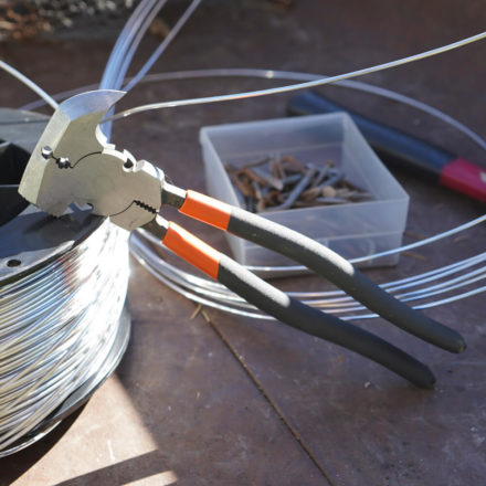 Malco's FCP1 next to a spool of fence wire