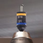 Drill with a Malco C-Rhex Magnetic Hex Driver screwing in a screw into a piece of sheet metal